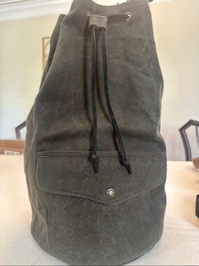 Filson Olive Canvas Drawstring Backpack with Front Flap Pocket